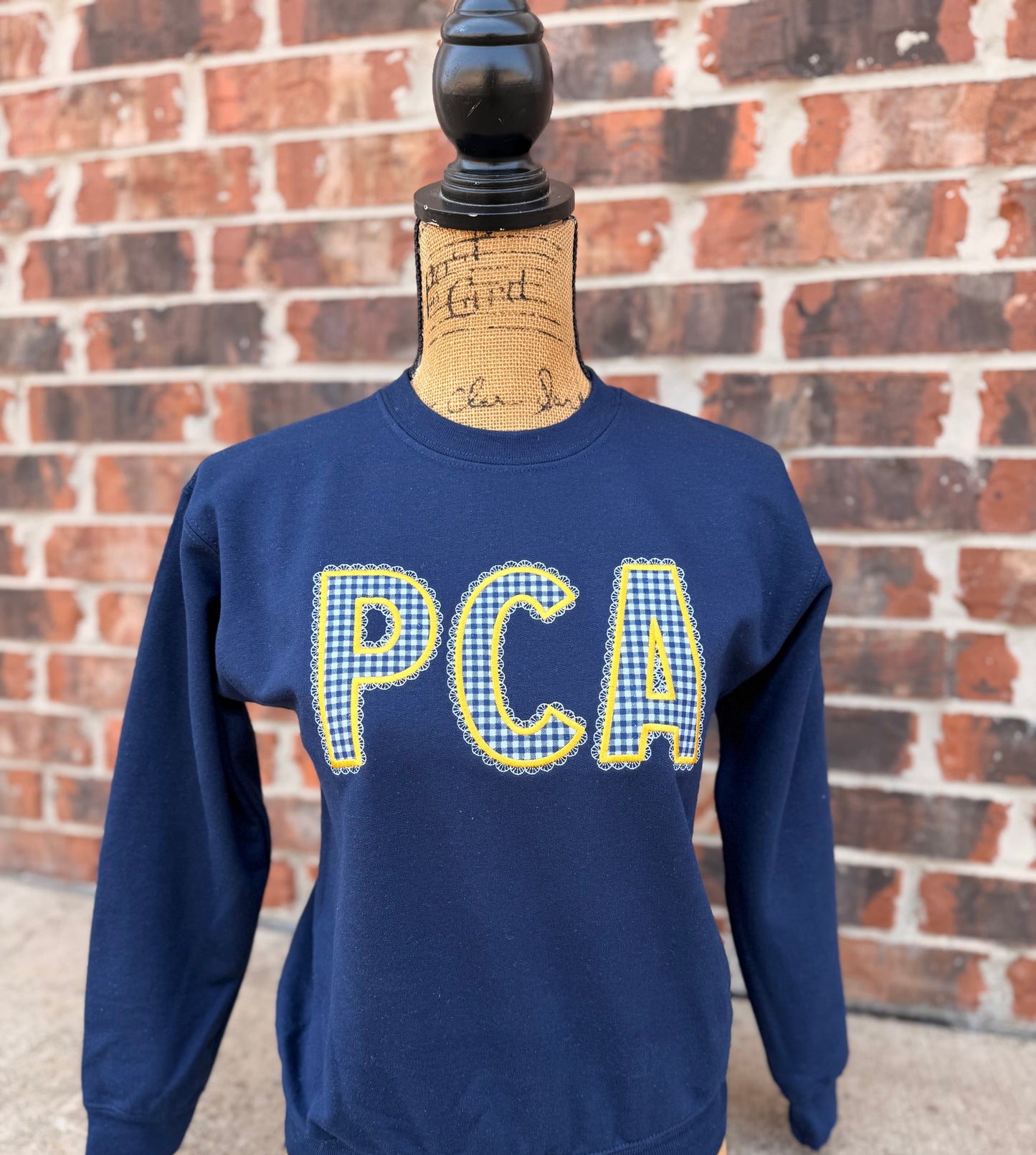 PCA Lace Applique on Navy Gildan Crewneck