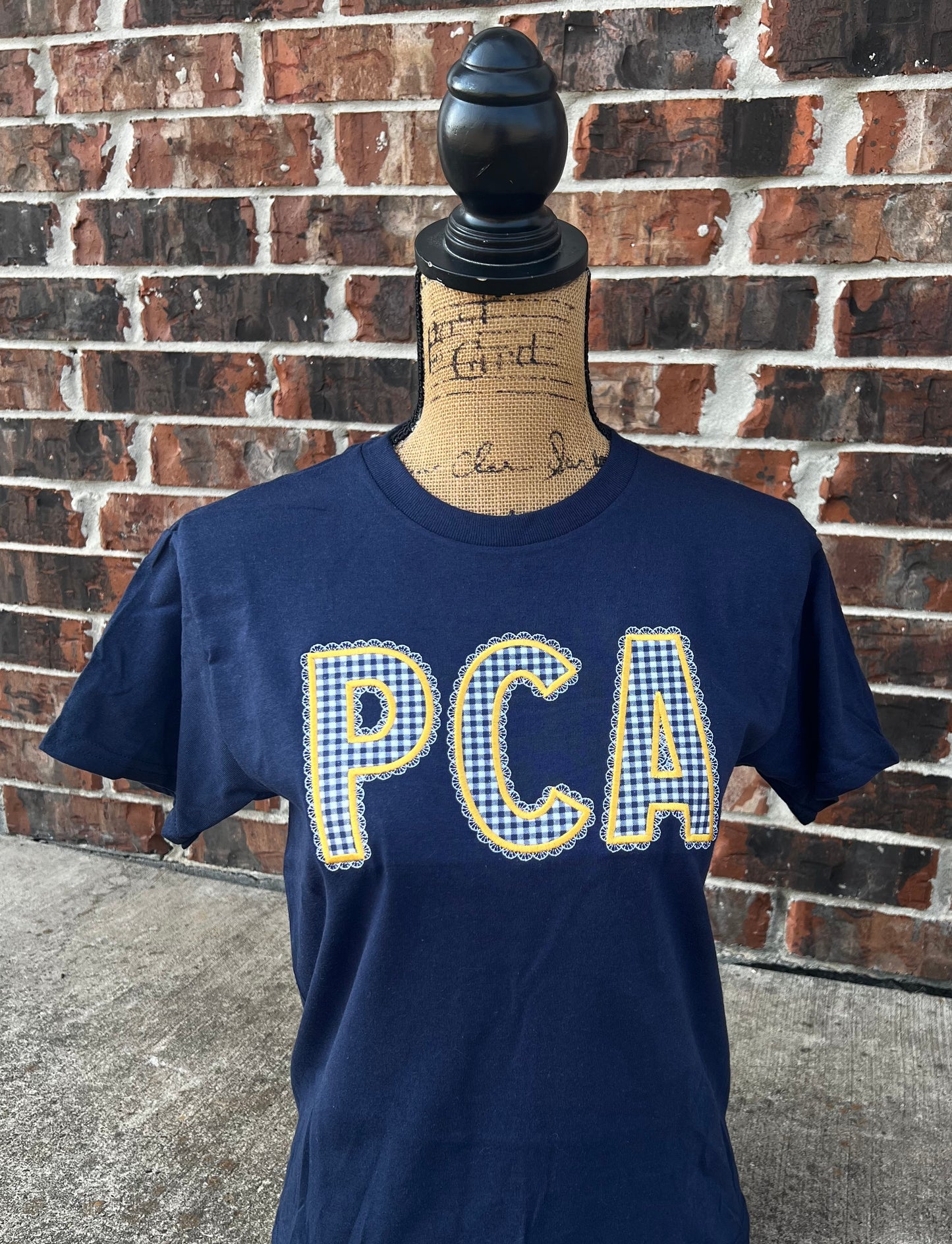 PCA Lace Applique on Navy Gildan Tee